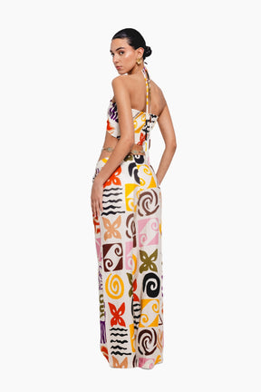 Woman wearing a colorful patterned dress 