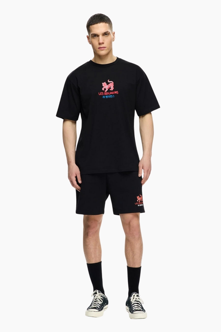 man wearing a black matching outfit