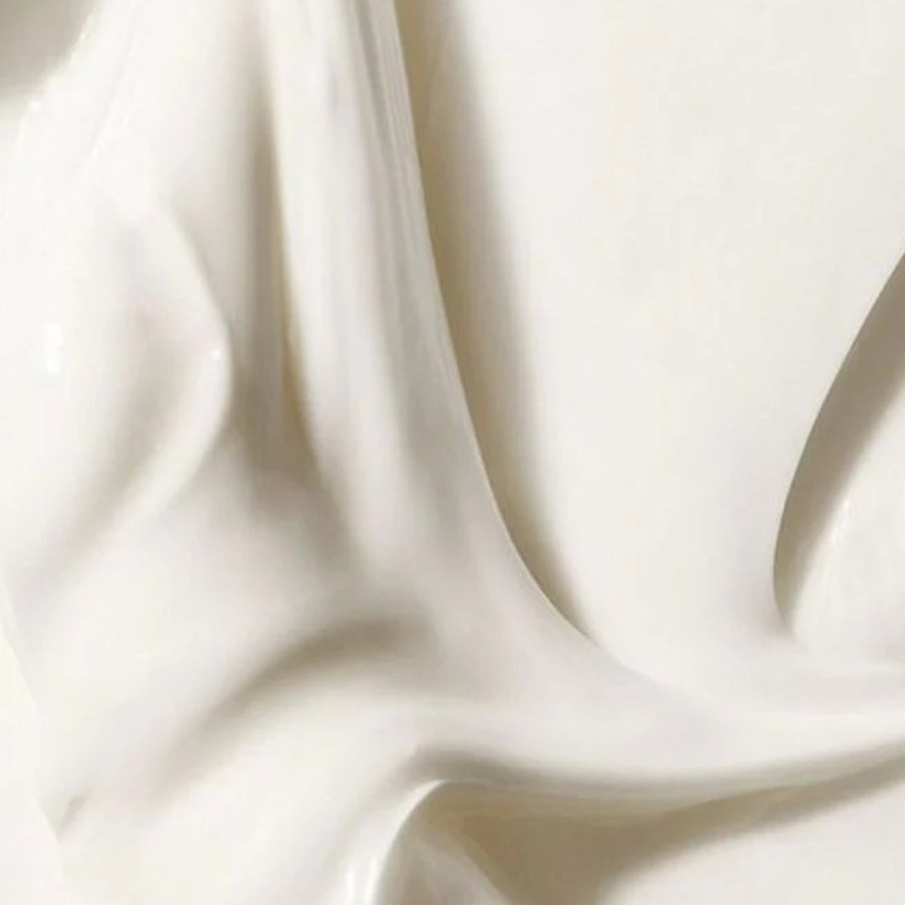 Close-up of beige fabric with soft folds