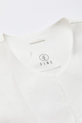 White shirt with 'FIND' logo on a white background