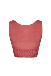 Red crop top on a white background