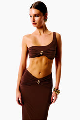 Woman wearing a brown dress 
