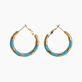 Gold round earrings w/aquamarine