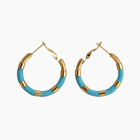 Gold round earrings w/aquamarine