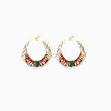 Pair of gold hoop earrings with red and green accents 