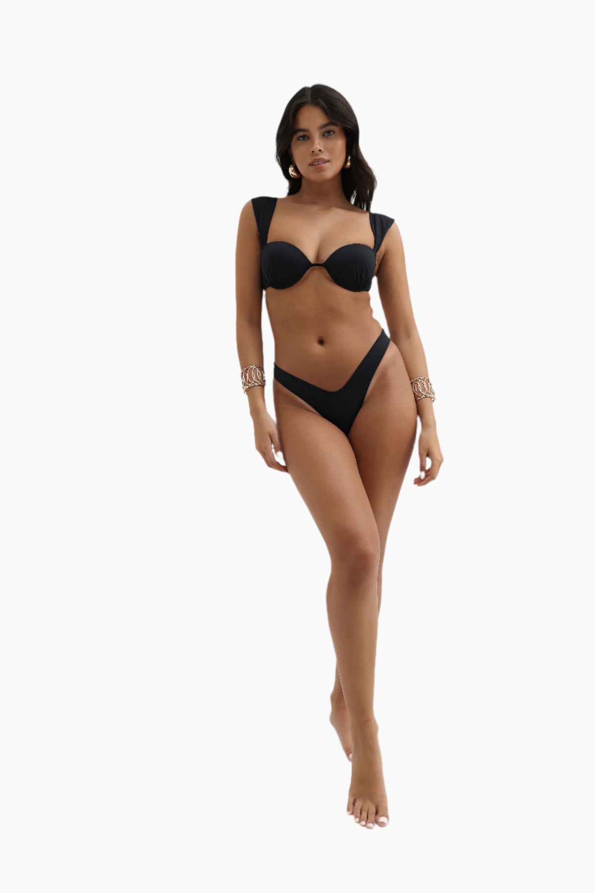 Woman wearing a black bikini on a white background