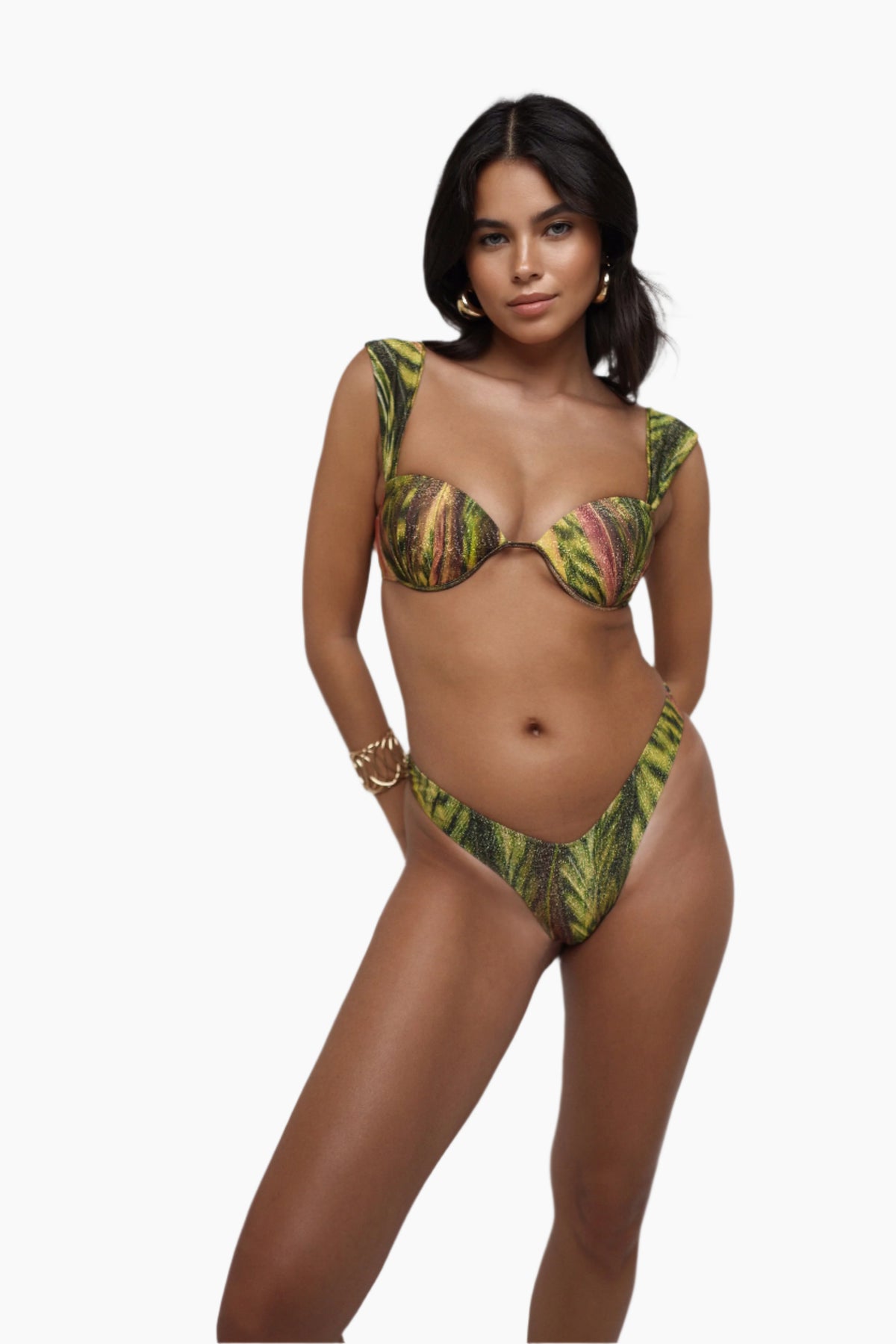 Model wearing a green and brown patterned bikini against a white background