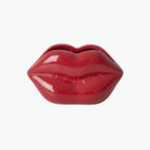 Red lip-shaped container