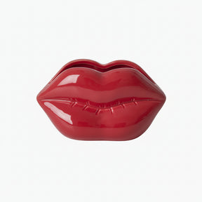 Red lip-shaped container