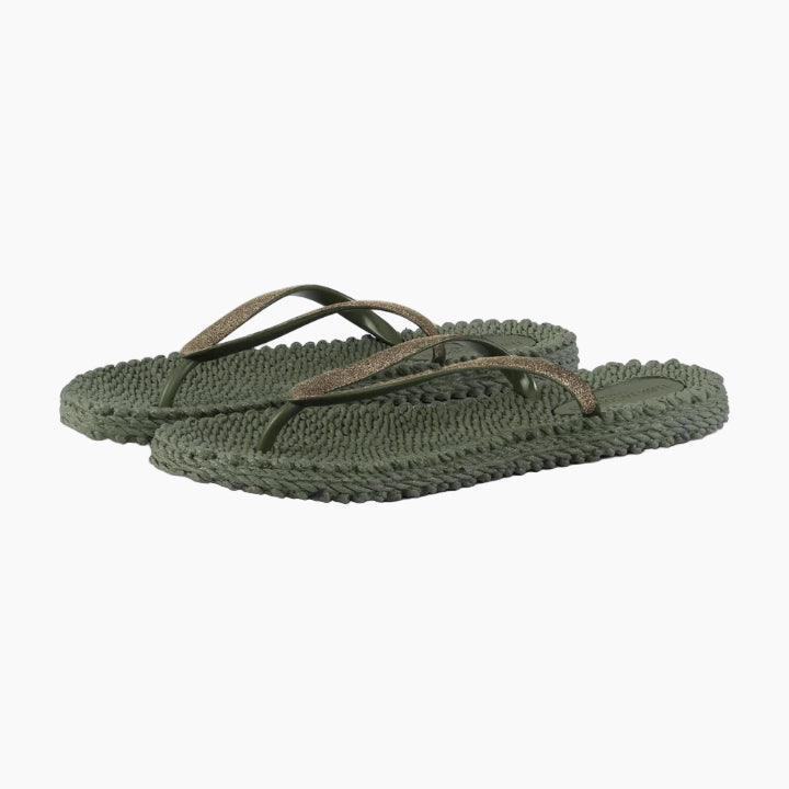 Green crochet sandals on a white background