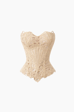 Beige lace corset on a white background