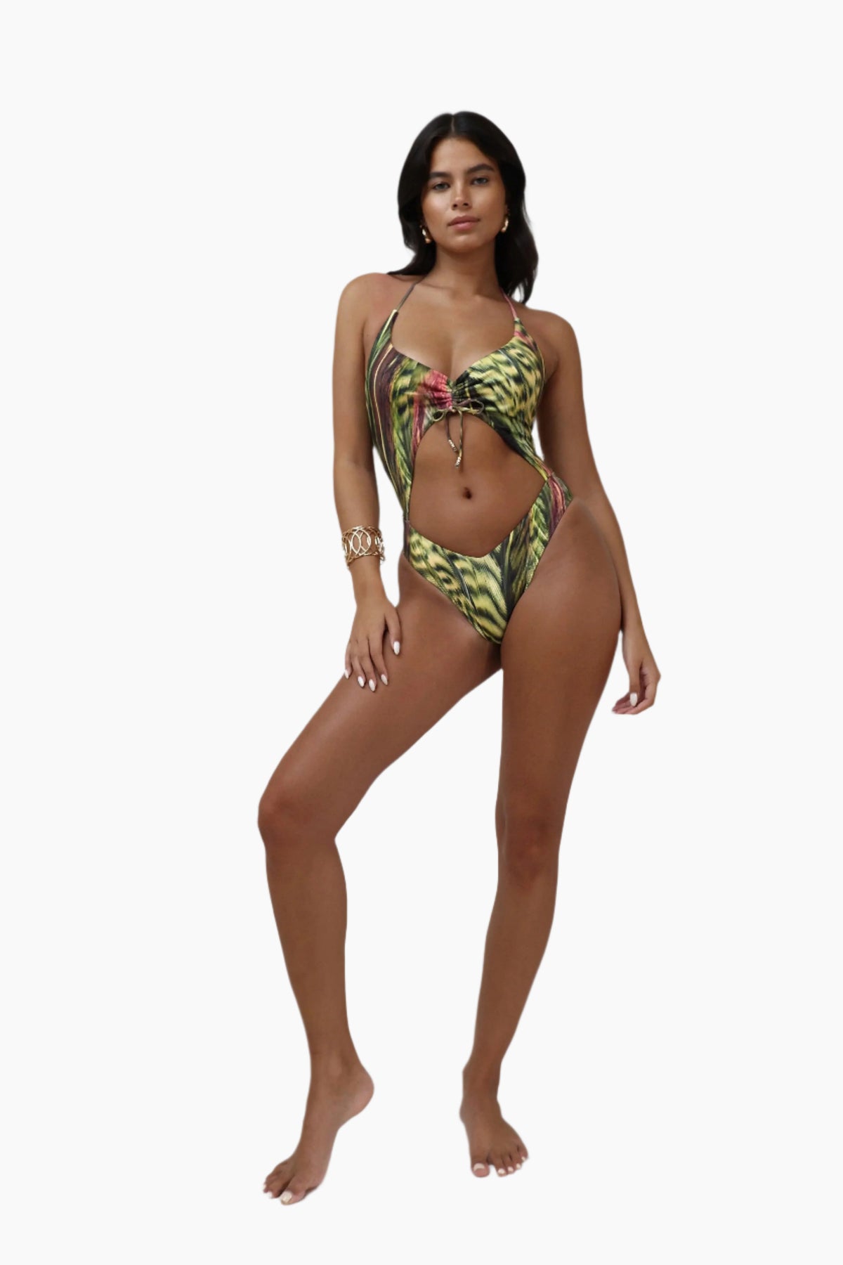 Woman wearing a green and yellow patterned bikini 