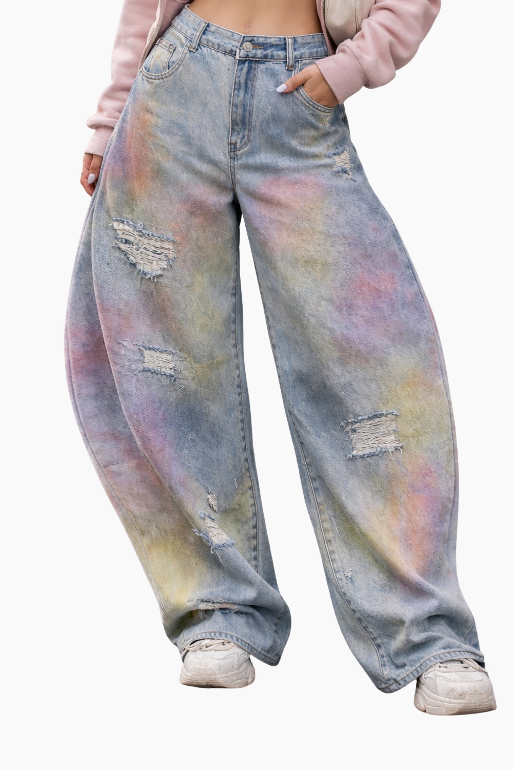 Tie-dye jeans worn by a person on a white background