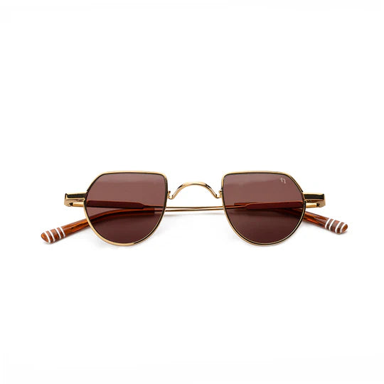 Sunglasses with gold frame and brown lenses , white stripped arms