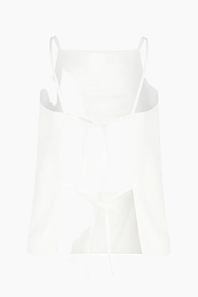 White tank top on a light gray background