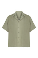 Green short-sleeve shirt on a white background