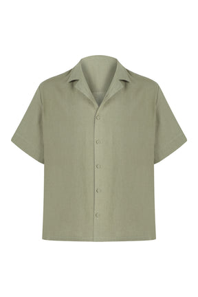 Green short-sleeve shirt on a white background