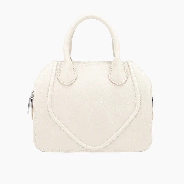 White handbag with a heart-shaped design on a white background