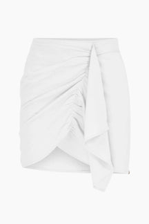 White ruched skirt on a white background