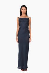 Woman wearing a navy blue evening gown 
