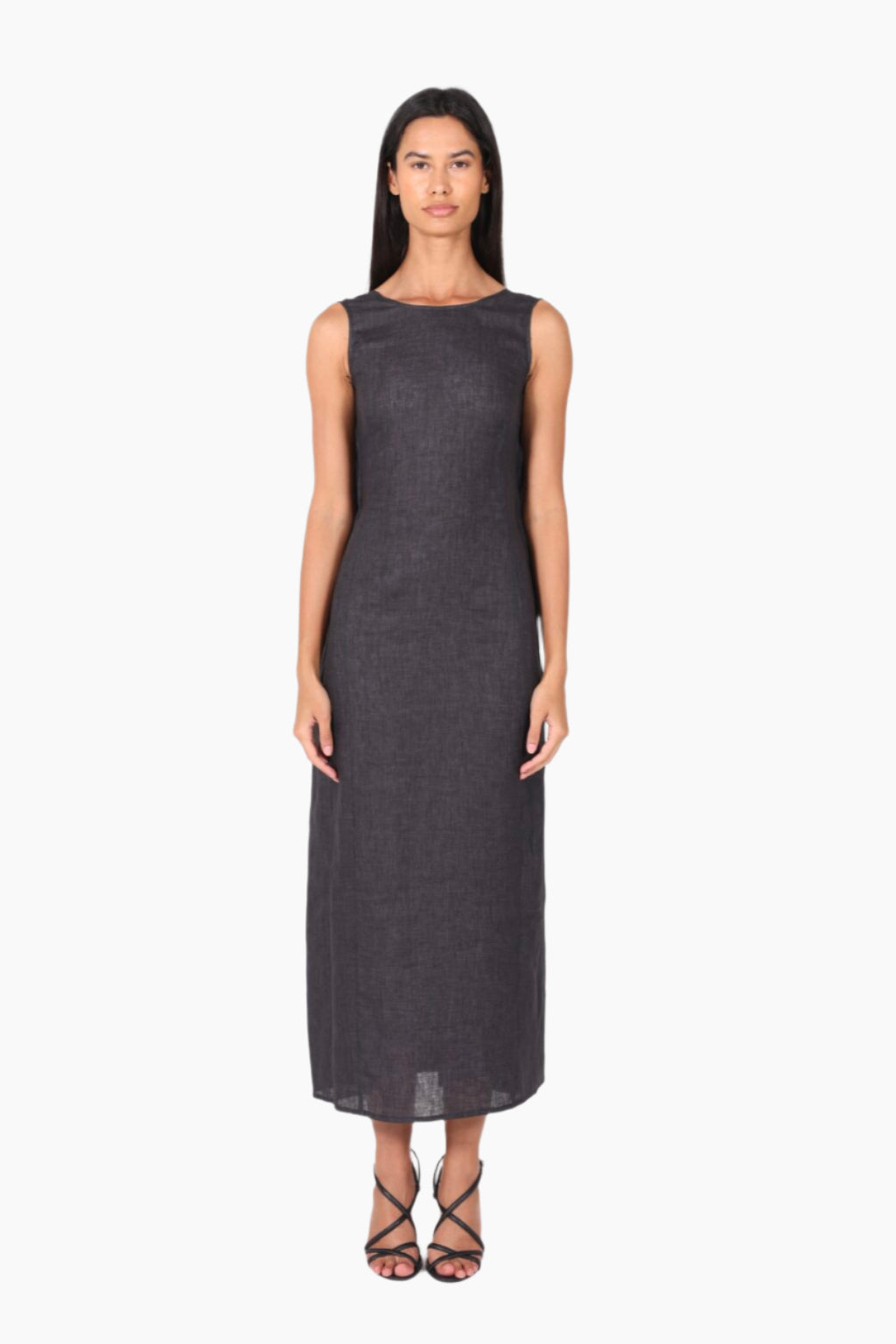 Woman wearing a black sleeveless dress 