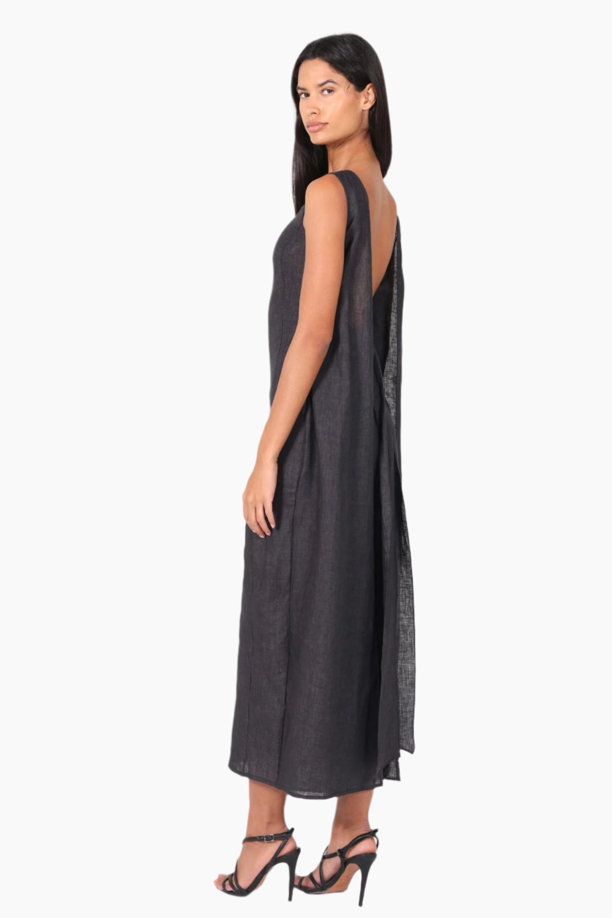 Woman wearing a black sleeveless dress 