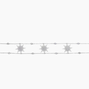 Silver necklace with star-shaped pendants on a white background