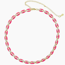 Necklace with pink and gold beads on a white background