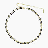 Necklace with black and white beads on a white background