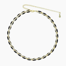 Necklace with black and white beads on a white background
