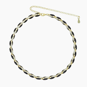 Necklace with black and white beads on a white background