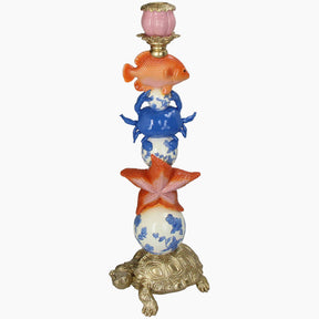 Decorative candle holder with turtle base, starfish, crab, and fish 