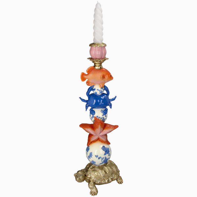 Decorative candle holder with sea-themed design