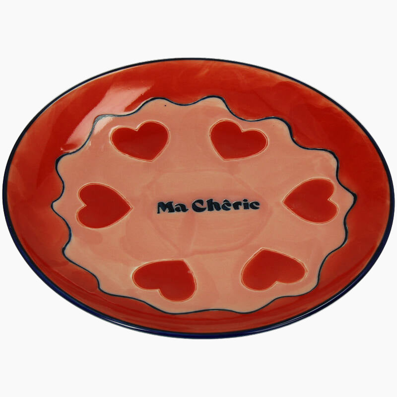 Ceramic plate with heart designs and 'Ma Chérie' text 