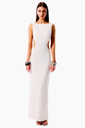 Woman wearing a white sleeveless dress 
