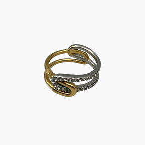 Two-tone ring with embedded stones