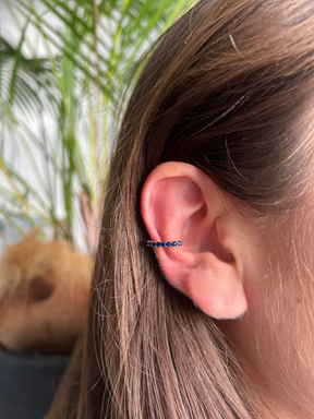 One Sided Oval Blue Colored Crystals Line Earcuff