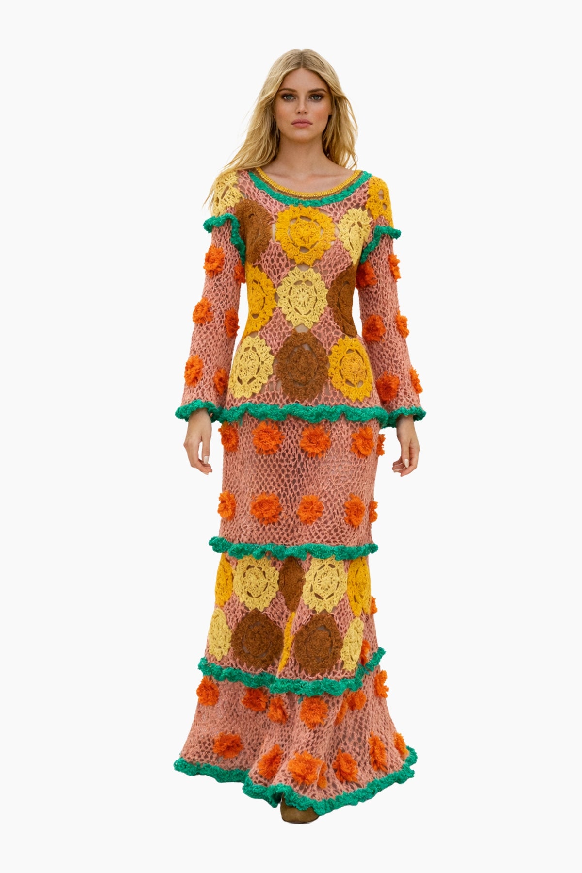 Woman wearing a colorful, patterned dress on a white background