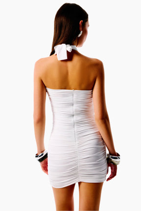 Woman wearing a white strapless dress 