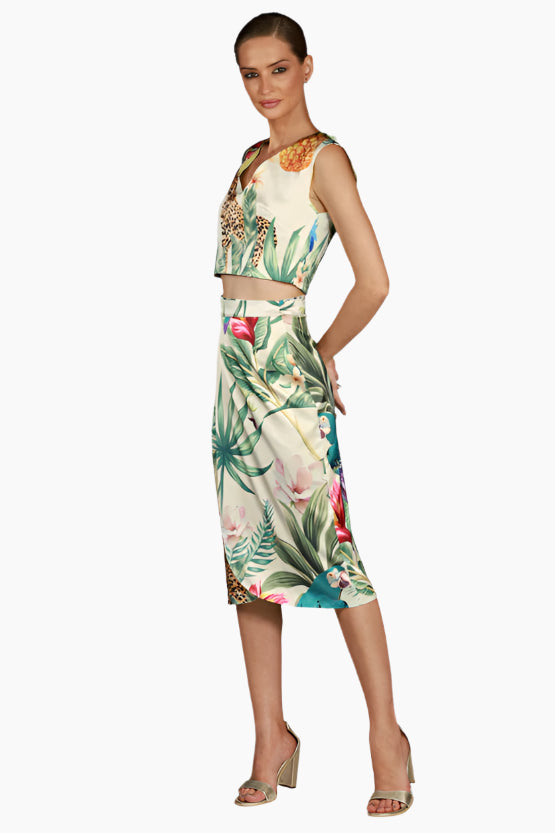 Woman wearing a tropical print patterned long skirts with matching tops
