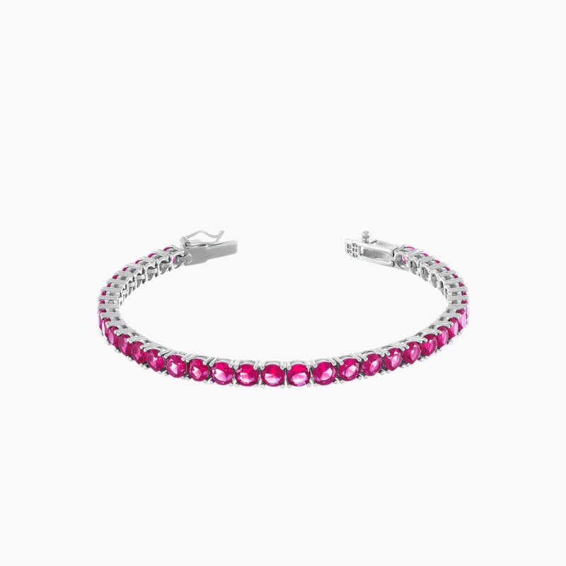 Bracelet with pink gemstones on a white background