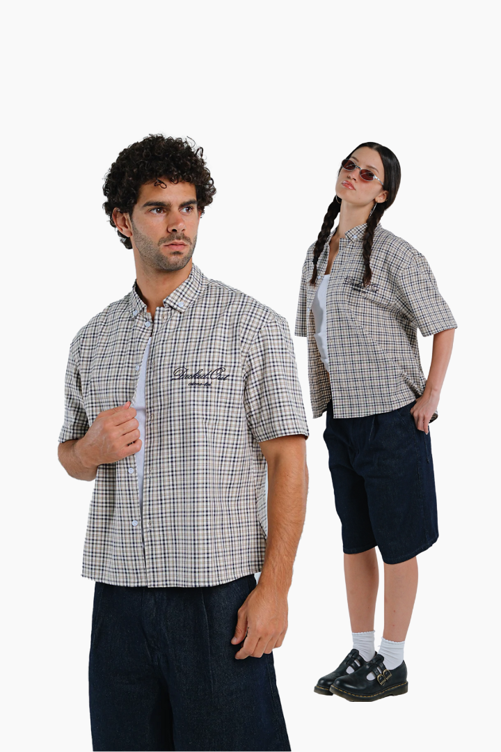 Two people wearing checkered shirts 