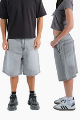 Two people wearing gray shorts 