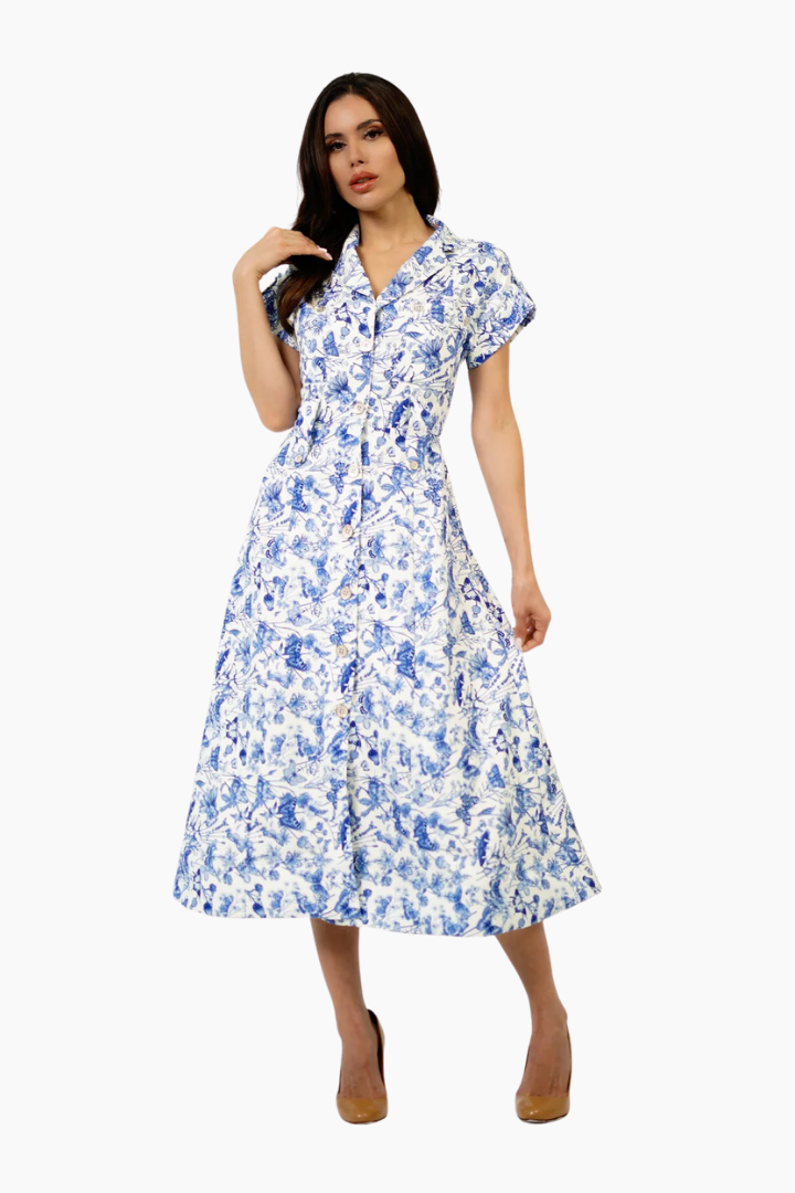 Woman wearing a floral dress on a white background