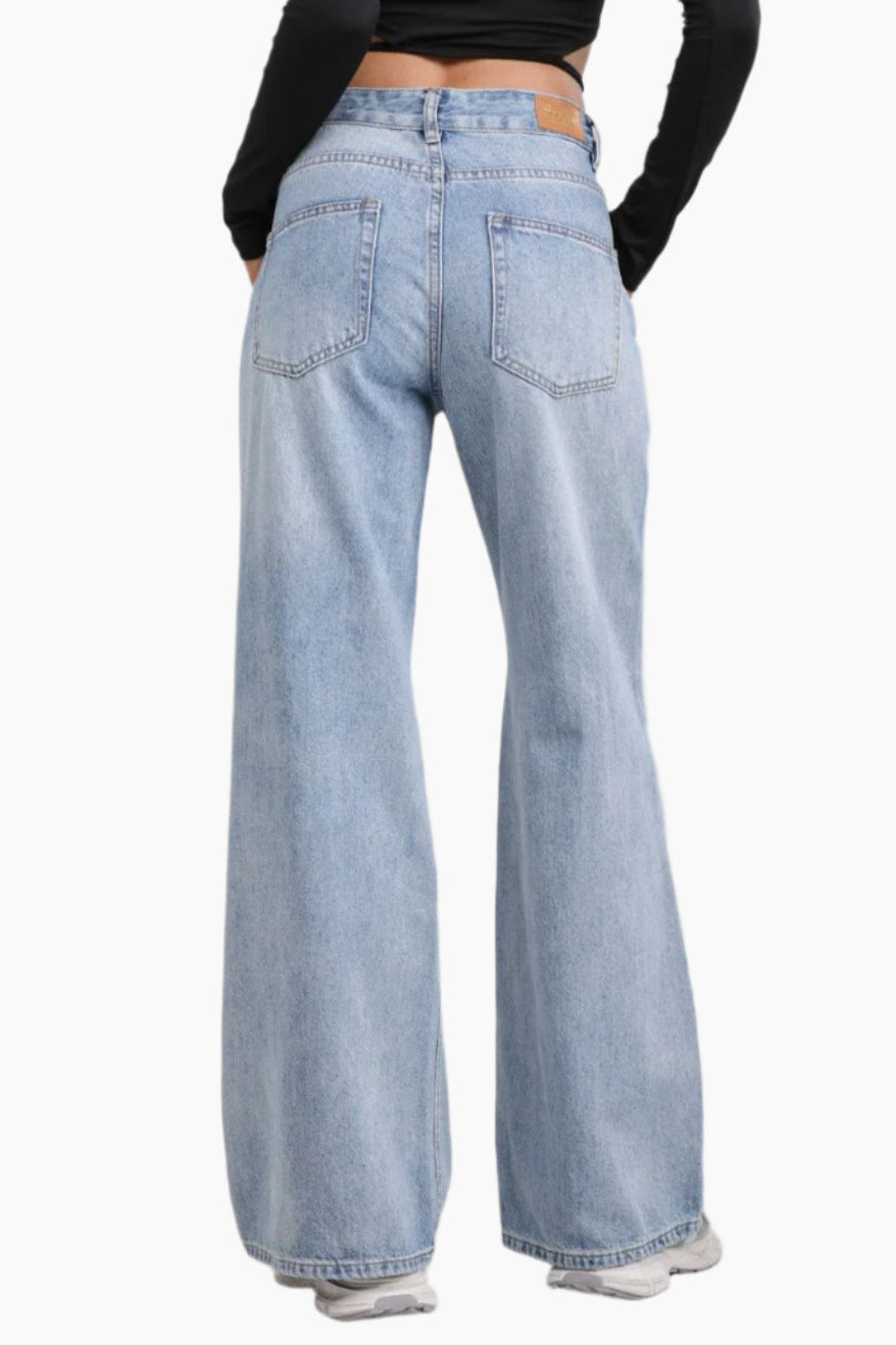 Light blue jeans worn by a person 