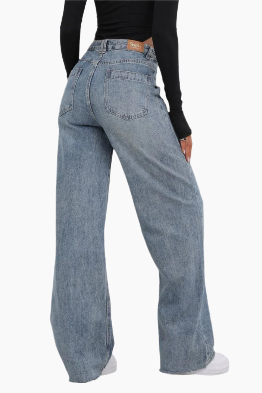 Person wearing light blue jeans 