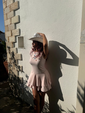 White straw hat with seashell chains