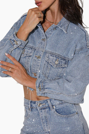 Denim jacket with sequin embellishments on a white background