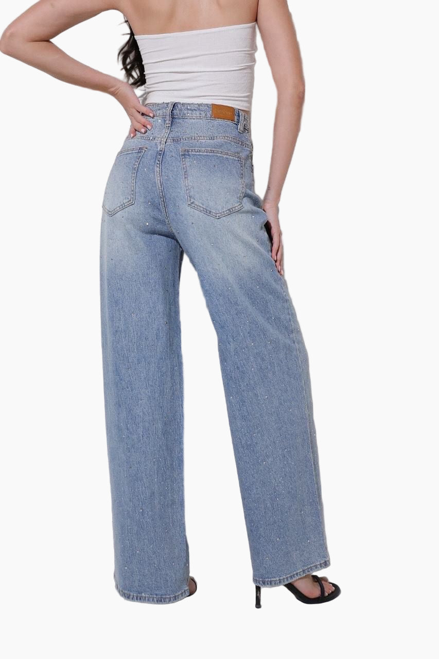 Person wearing light blue jeans 