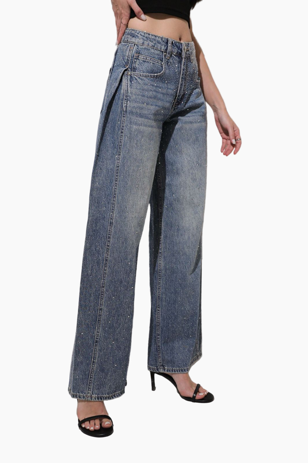 Blue jeans worn by a person 